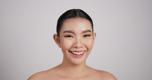 Close up of Beauty Asian woman face looking at camera