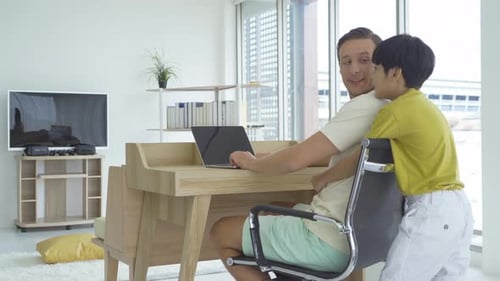 Loving Father and Child Interacting at Home