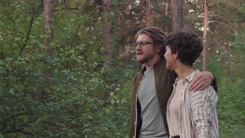 Loving Young Couple On Date In Forest