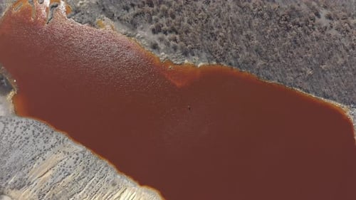 Polluted Red Water in a Barren Wasteland, Aerial