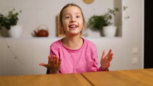 Emotional school girl vlogger speaking by video call blog talking