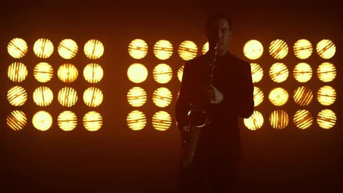 Talented Saxophonist Playing Instrument on Stage