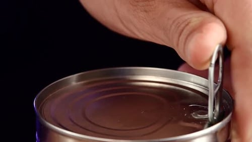 Opening a Can of Golden Corn Kernels