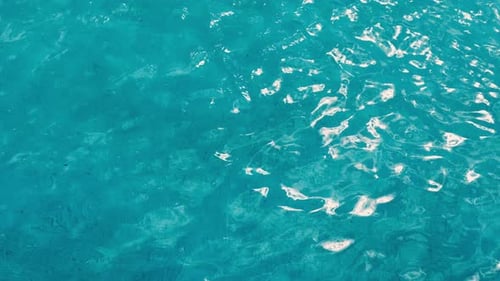 Rippled Water Surface. Crystal Clear Water Swimming Pool. Blue Water Background