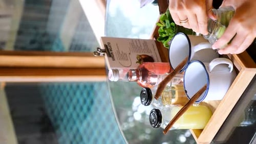 Preparing Refreshing Mojito Drinks at Outdoor Cafe