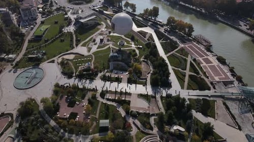 Drone View of a Beautiful Park in Tbilisi Next to the River Kura Sunny Day