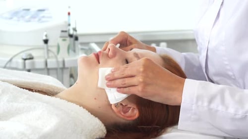 Woman Receives Facial Cleaning at Medical Spa