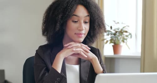 Woman Working From Home on Computer Video Call