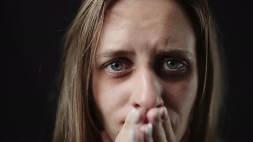 Distraught Woman Crying in Extreme Close-Up