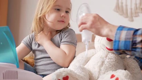Child Uses Nebulizer with Teddy Bear Buddy