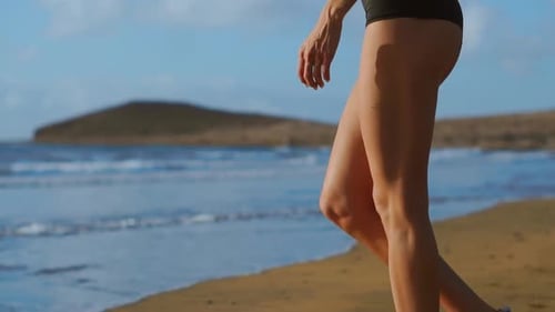 Close-up Shot of a Woman in White Sneakers Walking on Beach, Beautiful White Sand