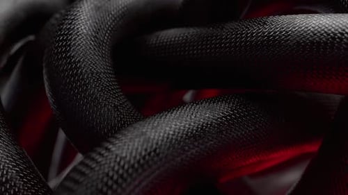 Clew of Black Wire se déplaçant et tournant comme un serpent avec une lumière d'enfer rouge