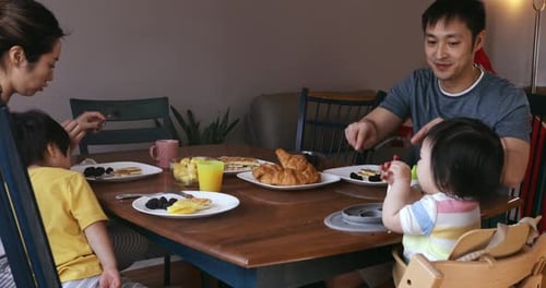 Family enjoying time relaxing together at home