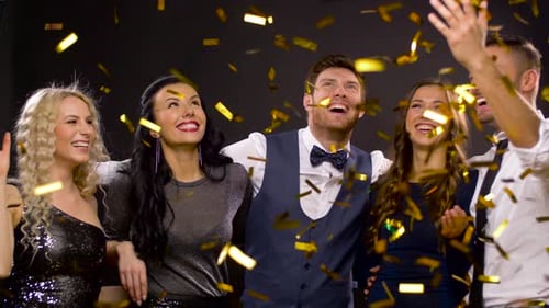 Friends Celebrating with Confetti at a Party