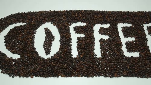 Coffee Beans Arranged to Spell Out "Coffee"