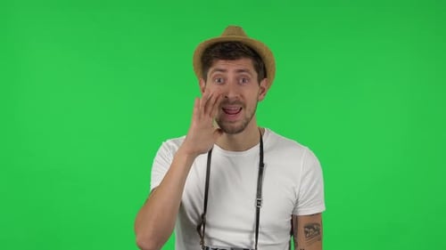 Portrait of Confident Guy Is Screaming Calling Someone