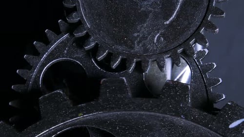 Interlocking Gears Rotating in a Close Up Shot