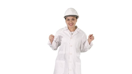 Female engineer dancing on white background.