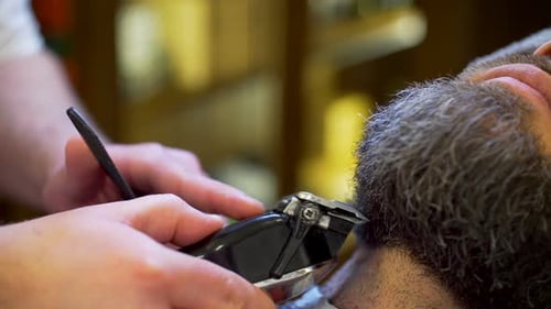 Bearded Man Getting Beard Haircut and Shaved