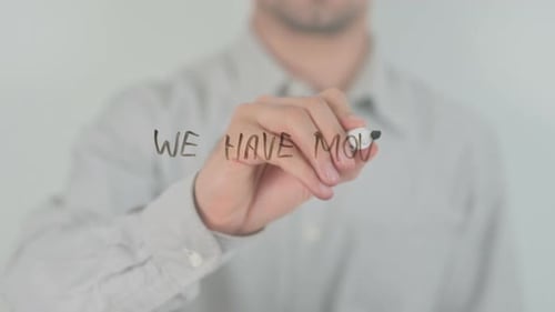 Writing We Have Moved on Clear Surface