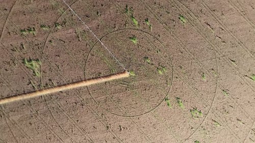 Aerial View of Harvested Farm Field with Irrigation System