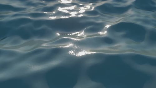 Bright Blue Sea Wave Surface in Motion