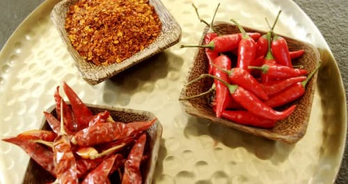 Red Chili Peppers and Spices Overhead Close Up