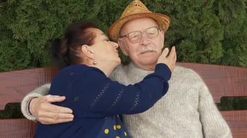 Portrait of a happy grandfather and grandmother . Beautiful elderly man and woman at home. Grandma k