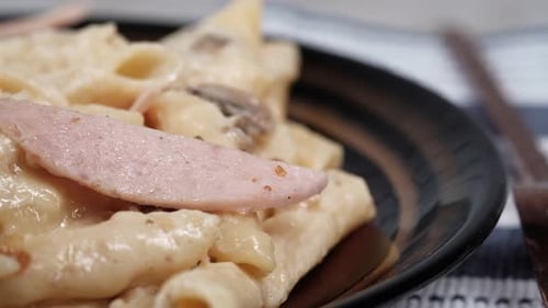 Creamy Pasta Dish with Meat and Mushrooms