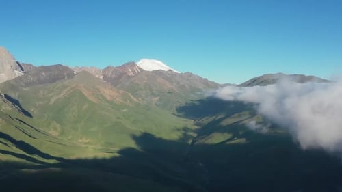 Aerial View of Clouds and Mountains at Sunrise