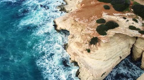 Coastline Aerial Top Down View Nature Landscape Pure Blue Sea Water with Waves at Rocky Coast