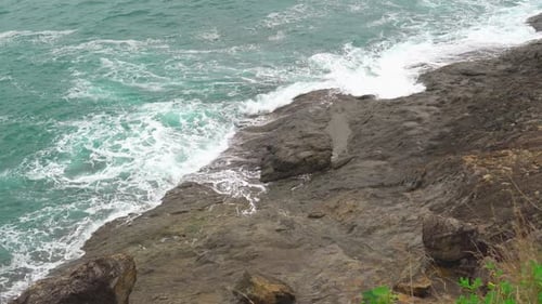 Waves of The Sea with Turquoise Water. the Waves Break on The Rocky Shore