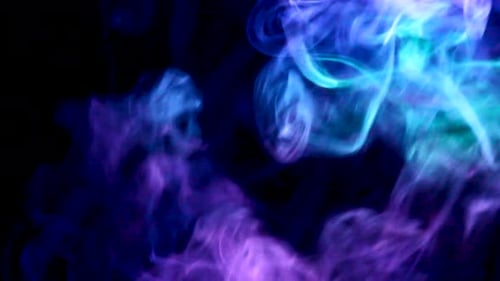 Colorful Smoke Swirling on Black Background