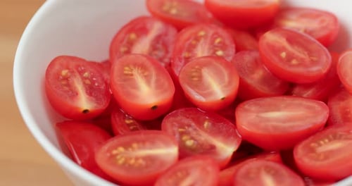 Halved Cherry Tomatoes in a Bowl