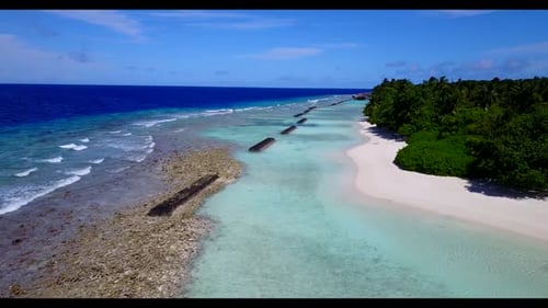Aerial flying over landscape of exotic lagoon beach trip by blue lagoon with white sandy background