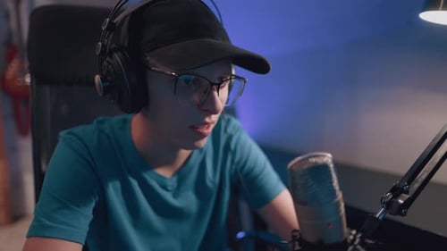 Young Adult Recording a Podcast at Home