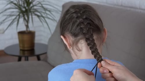Braiding a Child's Hair Indoors