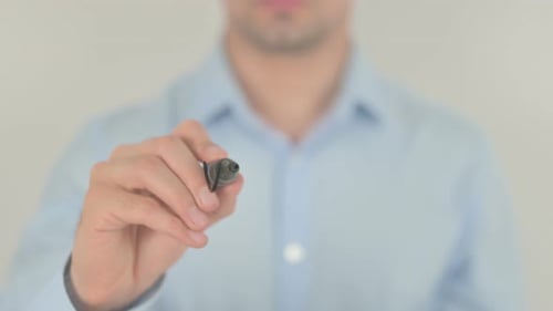 Person Writes Visualize On Clear Surface With Marker
