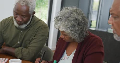 Seniors Enjoying a Friendly Game of Bingo Together