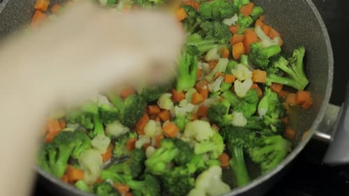 Stir Frying Broccoli, Cauliflower, and Carrots
