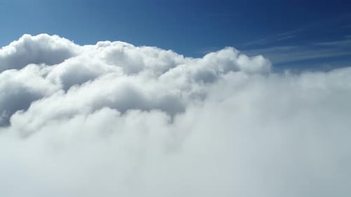 Aerial View of White Puffy Clouds and Blue Sky