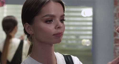 Close-up of a Cosmetologist Applying Make-up to Client