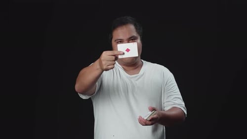 Young Adult Doing a Playing Card Trick