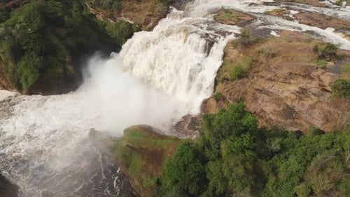 Aerial zenith drone shot of a waterfall in the nature.
Africa, Murchison Falls National Park Uganda.
