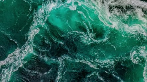 Waves of Water of the River and the Sea Meet Each Other During High Tide and Low Tide