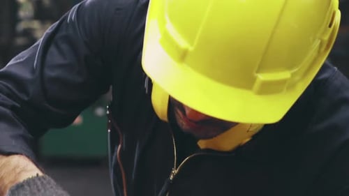 Smart Factory Worker Using Machine in Factory Workshop