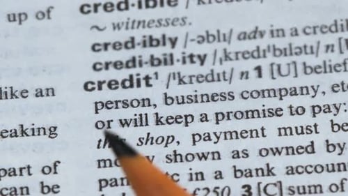 Close Up of Credit Definition with Pencil