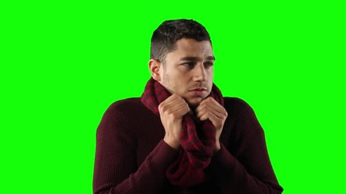 Front view of a Caucasian man on green background