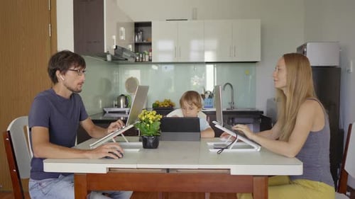 Family Working from Home Using Technology Devices