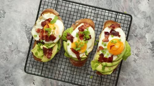 Fried Egg and Avocado Toast with Bacon
